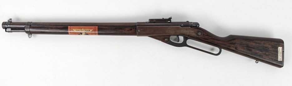Rare Daisy Defender No. 140 Repeating BB Gun: Rare Daisy Defender No. 140 Repeating BB Gun. Features a reproduction paper label, darkened metal finish, and dark wood musket style stock. Rifle is in very nice aged condition with refurbishments. Ci