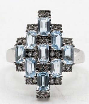 Ladies Sterling Silver Aquamarine Cocktail Ring: Ladies sterling silver synthetic aquamarine cocktail ring. The ring is size 10 and the total weight is approx. 5.28 grams.
