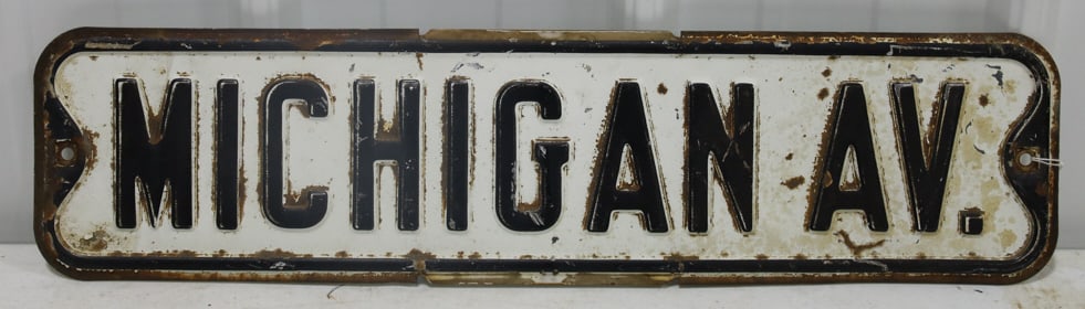 SST Embossed Michigan Av. Street Sign: Vintage SST embossed Michigan Av. street sign. The sign measures 5-7/8" tall x 23-3/4" across and is in good condition with some paint loss ans surface rust.