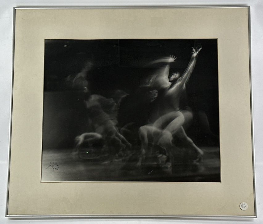 Robert Schiller Gelatin Silver Photograph: Silver gelatin photograph by famous photographer Robert Schiller (Born 1925). The framed nude in motion photo is under glass, signed in the lower left. Sight measures approx. 23-1/4" across x 19-1/4" 