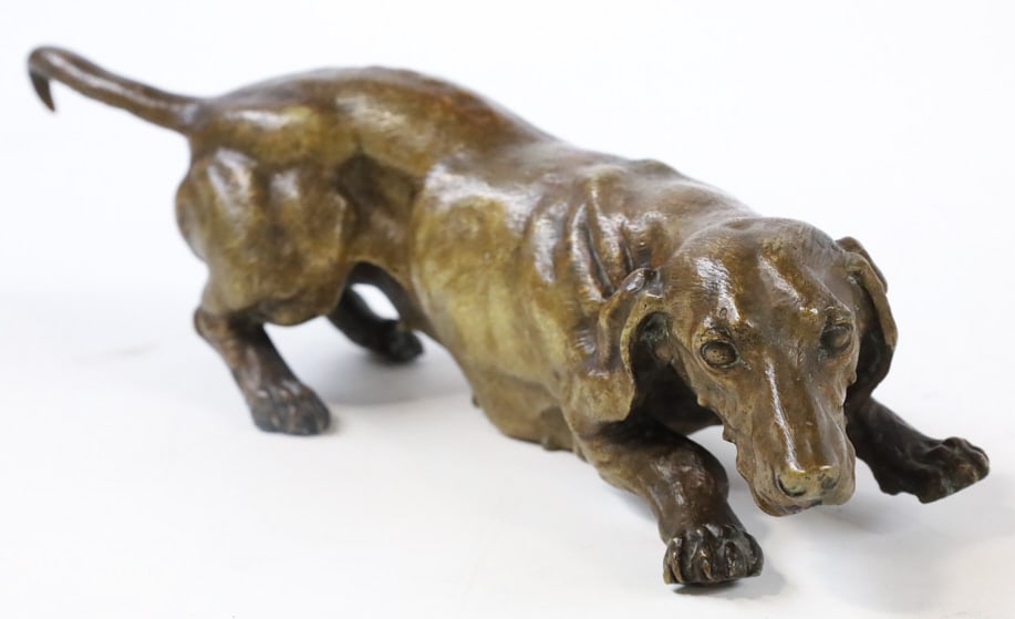 Austrian Bronze Crouching Dachshund Sculpture: Very nice vintage Austrian bronze sculpture featuring a crouching Dachshund. Great quality and detail, unsigned. Measures approximately 3" tall x 10-1/4" across x 3" deep.