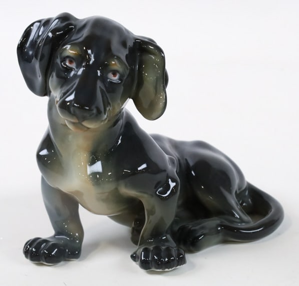 Rare Goebel Porcelain Dachshund Figurine: Rare vintage Goebel Germany porcelain figurine featuring a sitting Dachshund. Great quality and detail. Marked on the base, also reads "Depose", imported to France from Germany. Measures approximately