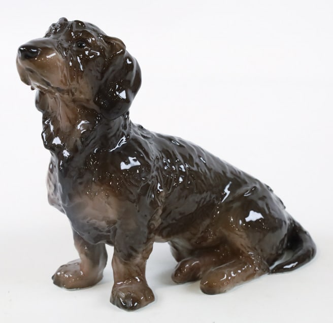 Rosenthal Porcelain Sitting Dachshund Figurine: Vintage Rosenthal Germany porcelain figurine featuring a sitting Dachshund. Great quality and detail. Marked on the base, designed by Rudolf Marcuse, #540. Measures approximately 7" tall x 8" across x