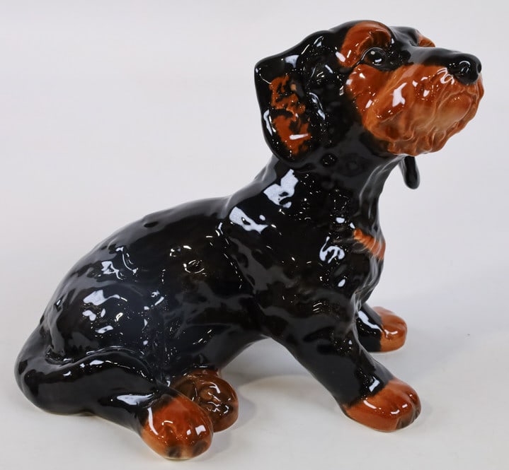 Goebel Porcelain Sitting Dachshund Figurine: Large vintage Goebel Germany porcelain figurine featuring a sitting Dachshund. Great quality and detail. Marked on the base, #30 078 22. Measures approximately 7-3/4" tall x 9" across x 6" deep. Great