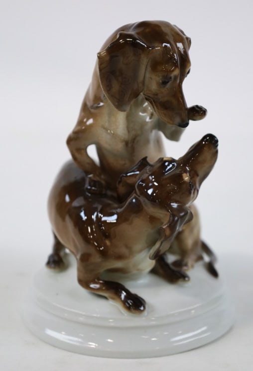 Karl Teichert Meissen Dachshunds Playing Figurine: Vintage Karl Teichert Meissen Germany porcelain figurine featuring Dachshunds playing. Great quality and detail, designed by R. Pabst. Marked on the base. Measures approximately 7-3/4" tall x 5-5/8" a