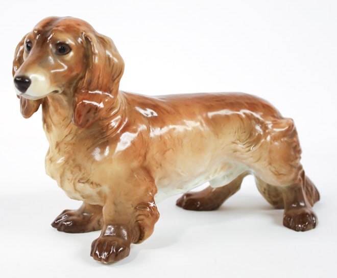Allach Porcelain WWII German Dachshund Figurine: Very rare WWII Germany Allach painted porcelain figurine featuring a standing Dachshund. Allach was the porcelain maker of Nazi Germany. Has the SS mark over Allach on the bottom. Great quality and de