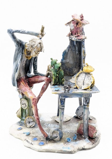 T. Moretto "Clockmaker" Italian Porcelain Figurine: Italian porcelain figurine titled "The Clockmaker" by Toni Moretto. Nice quality and detail, hand-painted details. Measures approximately 9-1/4" tall x 7-1/4" across x 6" deep. Nice condition.