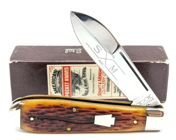 Schatt & Morgan Jig Bone Teardrop Knife w/ Box: Schatt & Morgan Jig Bone Teardrop Knife 041 906 w/ Box. Knife is in very nice condition with some light tarnishing on the bolsters from age. Measures 3-7/8in when closed.