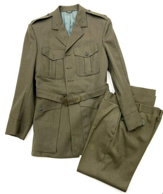 USMC Men's Officer Service Uniform Jacket & Pants: USMC Men's Officer Service Uniform Jacket & Pants. USMC Jacket & Pants are in very nice used condition. Inside of Jacket is a tag that reads Exchange Uniform Shop Quantico Virginia with the Marine log