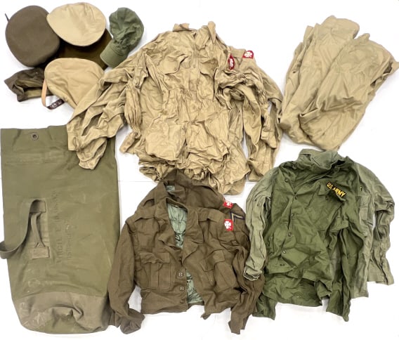 US Korean War Military Uniform Clothing Lot: US Korean War Military Uniform Clothing Lot. This lot conatins issued clothing to a Korean War Vetern. Lot includes 2 Ike Jackets, 2 green field shirts or jackets, 4 Khaki shirts, 3 pair or tan pants,