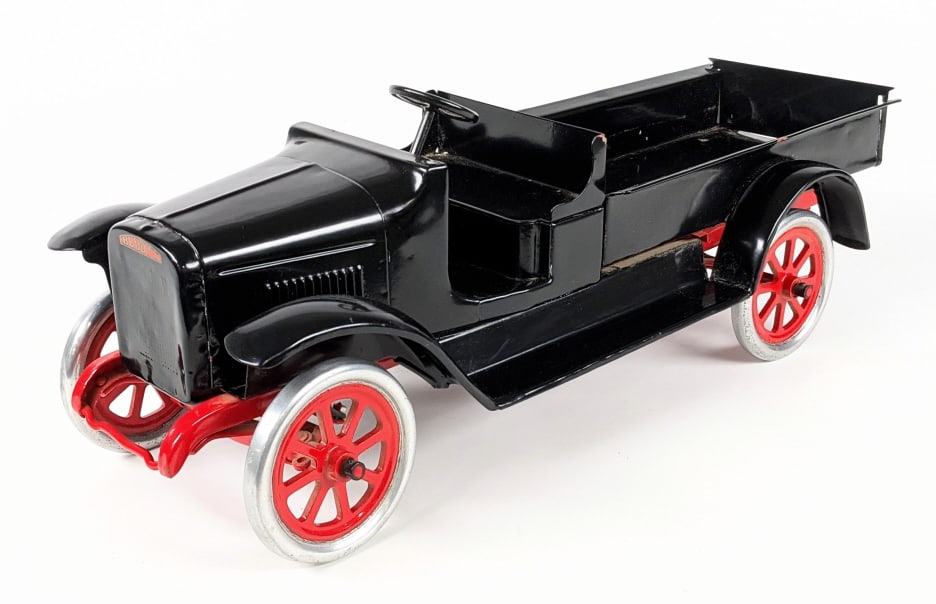 Restored Buddy L Express Truck: Restored Buddy L Express pickup truck. The truck has a couple paint chips, dents in the bed, crazing to the decal, and wear from age. Displays well with spoked wheels, red frame, and black open cab /