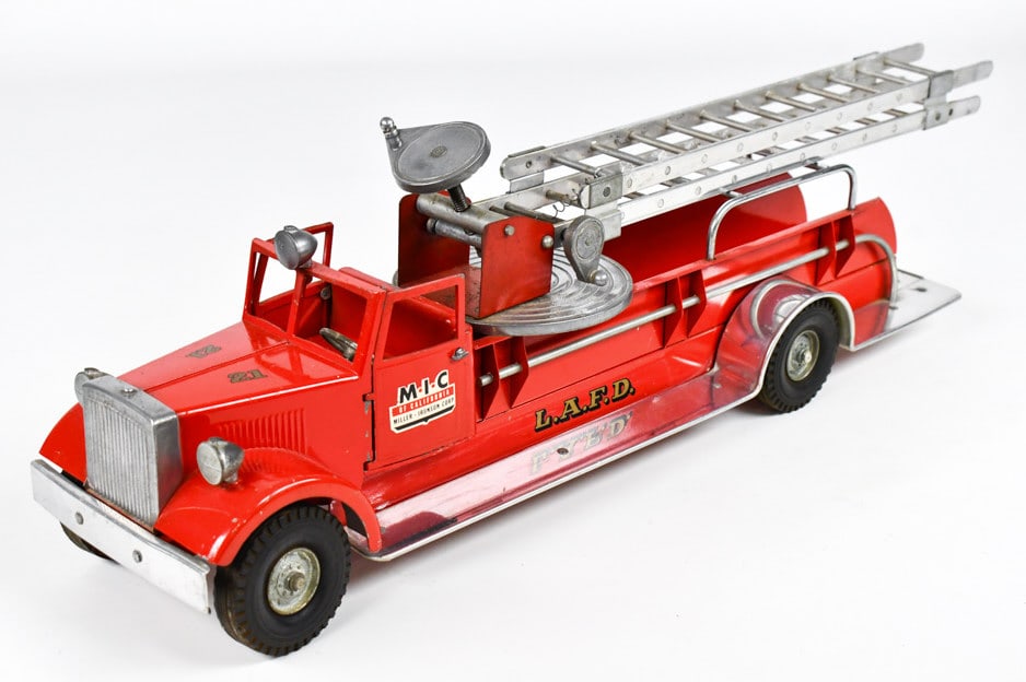 Smith Miller MIC LAFD Aerial Ladder Truck #21: Smith Miller MIC Los Angeles Fire Department aerial ladder fire truck #21. The paint on the truck is original. The crank to raise the ladder works, but the crank to extend the ladder is currently not 