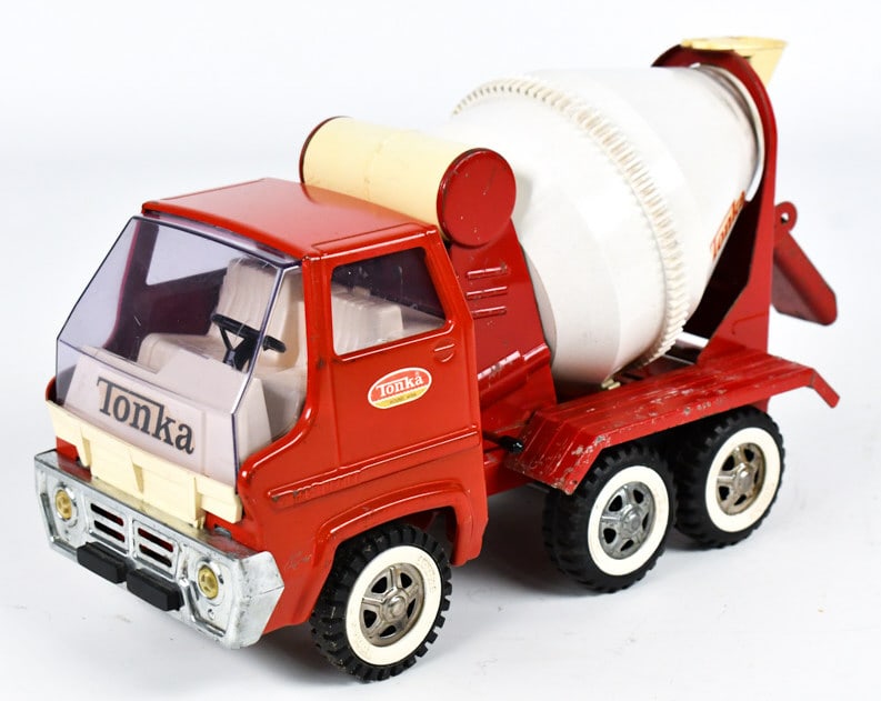 Tonka Turbine Cement Mixer Truck: Tonka Turbine concrete / cement mixer truck. The paint on the cab doesn't quite match the paint on the bed. The truck has paint loss, corrosion, and wear from age. Measures approximatley 14" long.