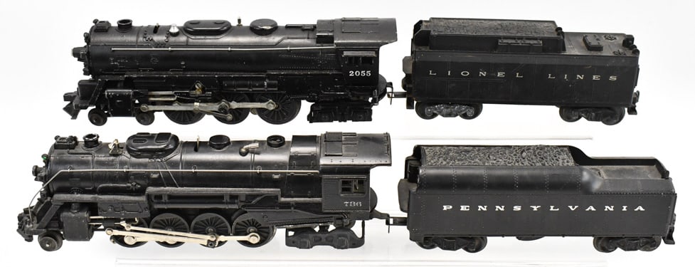 Lionel #2055 4-6-4 & #736 2-8-4 Engines w/ Tenders: Lionel #2055 4-6-4 engine with tender and #736 2-8-4 engine with tender. The #736 engine has some paint touch ups. Both havae some paint chipping and wear from use / age.