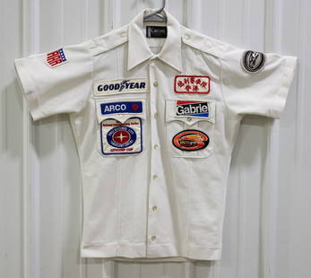 ArcoGraphite Gurney All American Racers Crew Shirt: Early 1970’s IZOD Gurney All American Racers Olsonite Jorgensen Steel Team-Issued Crew Shirt. Size medium. The shirt is in fair used condition with some stains and has sponsor patches on the front,