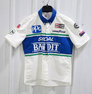 Skoal Bandit All American Racers Team-Issued Shirt: 1985 Skoal Bandit All American Racers Team-Issued Indycar Crew Shirt. The shirt is in nice used condition and has sponsor patches on the front, back, and sleeves.