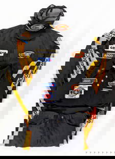 ArcoGraphite Eagle Racing Team-Issued Uniform: Full ArcoGraphite Eagle Racing Team-Issued Uniform Including Jacket, Hat, Polo, and Long Pants. Simpson patch is on the shirt collar. Has USAC National Championship Series patch along with other