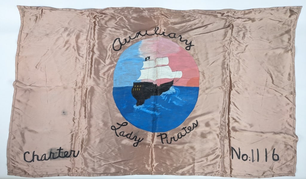 1950's Pink Satin Springfield Lady Pirates Banner: 1950's Pink Satin Springfield Lady Pirates Banner. Banner is hand painted with a sailing ship in the center, Charter No. 1116, and sticked gromet holes for hanging. Banner is in very nice condition wi