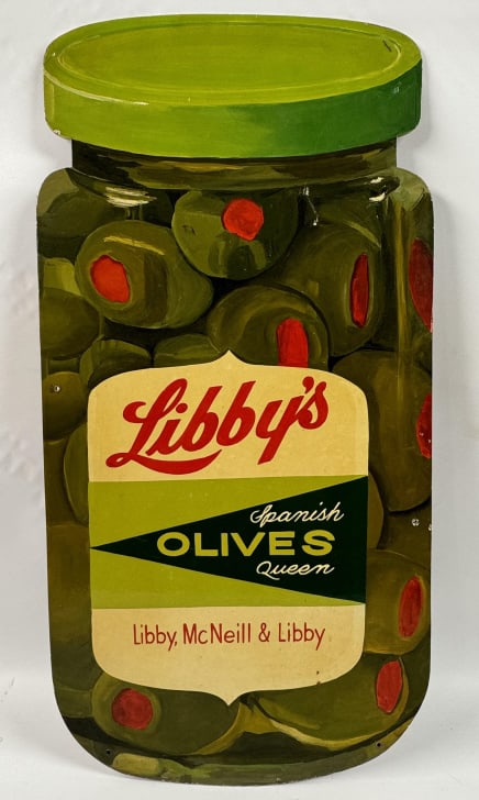 Vintage SSM Libby's Spanish Olives Sign: Unique vintage single sided masonite Libby's Olives hand painted advertising sign. Appears to be in overall good condition with paint loss, scratches, and wear from display and age. Overall it measure