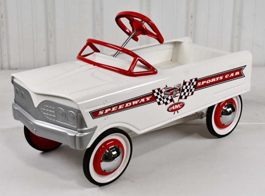 Restored Murray Speedway Sports Car Pedal Car: Professionally Restored Murray Speedway Sports Car Pedal Car. The car is missing the fender reflector ornaments. Good condition with a professional restoration. Measures 33in length.