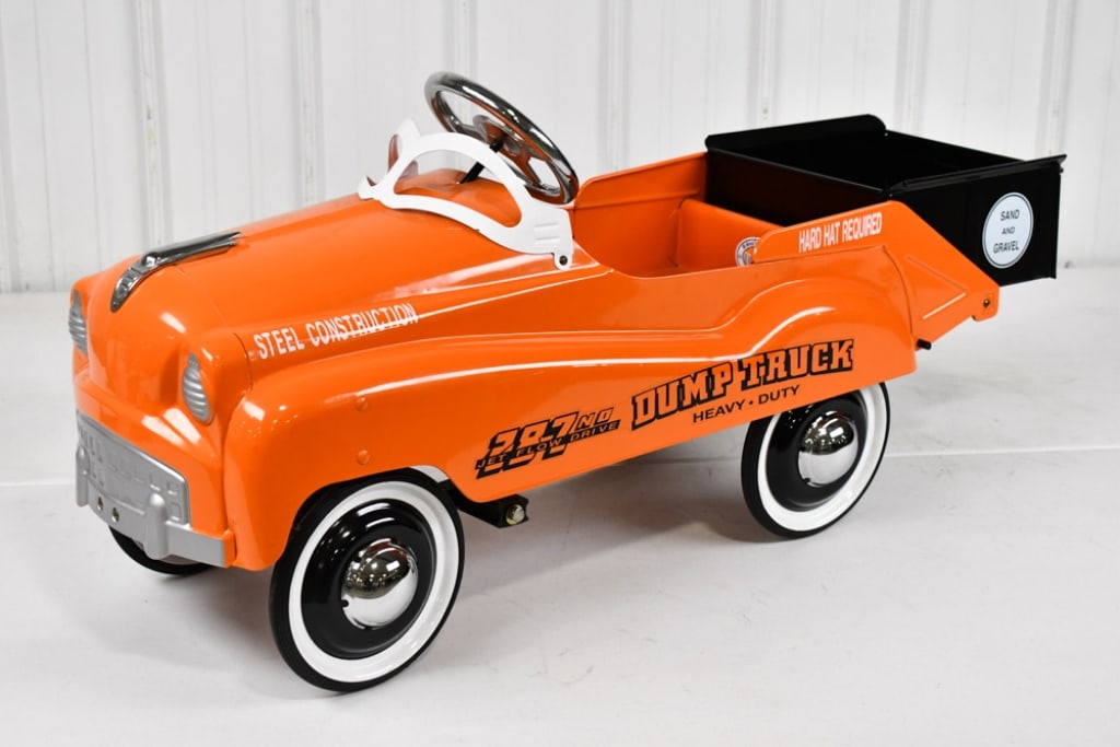 Contemporary Heavy Duty Dump Truck Pedal Car: Contemporary Sand and Gravel Heavy Duty Dump Truck No. 287 Pedal Car. The bed dumps and the tailgate opens. The car is in good condition with light wear from age. Measures 45in length