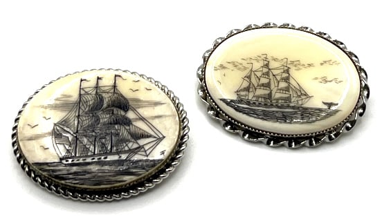 (2) Sterling Silver Scrimshaw Nautical Brooches: (2) Sterling Silver Scrimshaw Nautical Brooches. Both Oval Brooches Depict Schooners, with One Containing A Whale Tail Breaching The Water. Both Are Stamped Sterling, No Signatures Are Visible. Each B