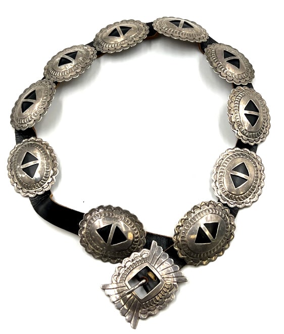 Sterling Silver and Leather Concho Belt: Sterling Silver and Leather Concho Belt. This Belt Is Believed To Be Navajo. It Is Unmarked and It Measures 34". The Soldered Loops Are Copper. The Total Wt. Is 10.218 ozt.
