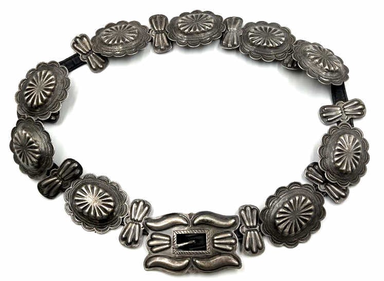 Sterling Silver and Leather Concho Belt: Sterling Silver and Leather Concho Belt. This Belt Is Believed To Be Vintage Navajo. It Is Unstamped and It Measures 33" and Has A Total Wt. Of 8.42 ozt.