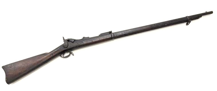 Springfield Model 1873 .45-70 Trapdoor Rifle: Springfield Model 1873 .45-70 Trapdoor Rifle. The Springfield Model 1873 is in nice used antique condition. Barrel measures 32.5 inches in length. Rifle obtains a rear adjustable sight, no cleaning ro