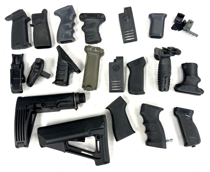 AR-15 and Rifle Accessories.: AR-15 and Rifle Accessories. Forehand grips butt stocks and pistol grips. 15 total pieces