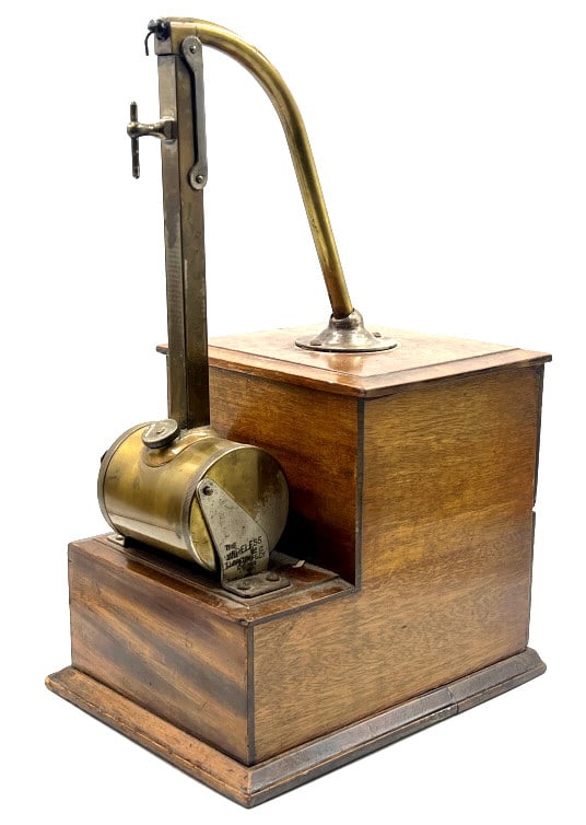 The Eldred Wireless Antique Tabletop Lighter No 12: The Eldred Wireless Antique Tabletop Lighter No 12. Very ornate wooden and brass tabletop Cigar lighter. Dimensions: 10-1/2" Deep x 7-3/4" Wide x 16" Tall
