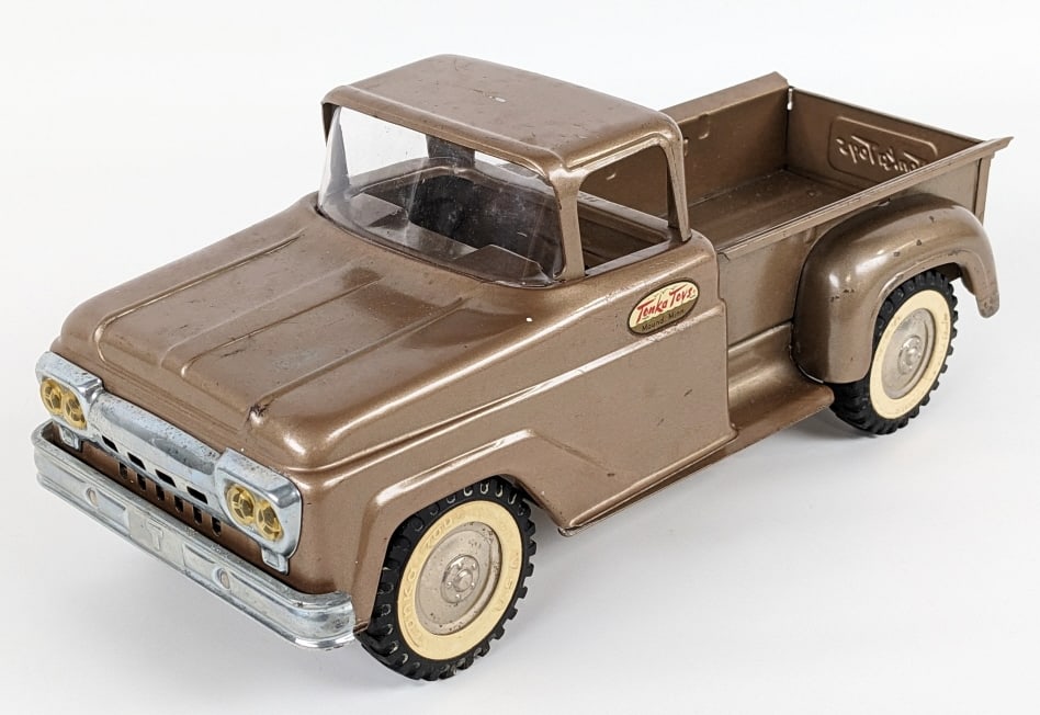 Original Tonka Square Fender Stepside Pickup Truck: Original Tonka bronze square fender stepside pickup truck. The truck has light paint loss and wear from play / age. Measures approximately 13" long.