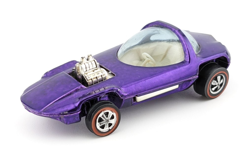 Hot Wheels Redline Purple Silhouette - U.S.: Hot Wheels Redline United States purple Silhouette car with white interior. The car has a small micro on the front passenger side fender and on the beam above the windshield. The car has some toning a
