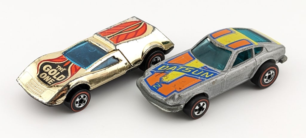 Hot Wheels Redline Flying Colors Z Whiz & Buzz Off: Hot Wheels Redline Flying Colors gray Z Whiz Datsun and gold chrome Buzz Off. Both cars have some rubs and wear from play / age.