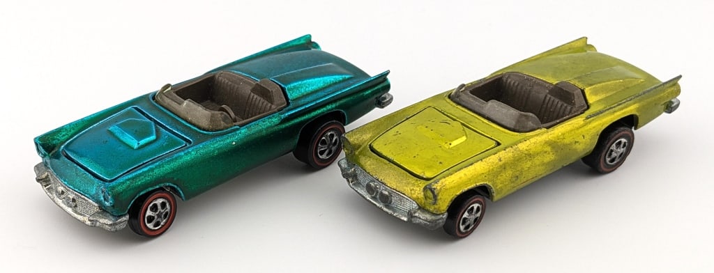 (2) Hot Wheels Redline Classic 57 T Bird: (2) Hot Wheels Redline aqua and antifreeze Classic '57 T-Birds. The aqua car has a micro chip on the driver side door and toning throughout. The antifreeze car has some edge wear, and some paint loss 