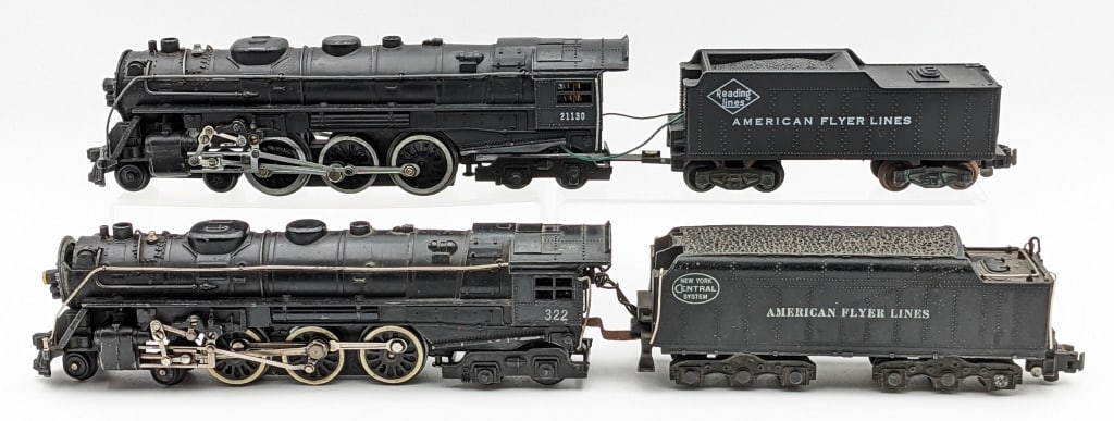 American Flyer #21130 & #322 Engine w/ Tenders: American Flyer S Gauge #21130 4-6-4 engine with Reading Lines tender and #322 4-6-4 engine with New York Central System tender. Both have paint loss and wear from use / age.