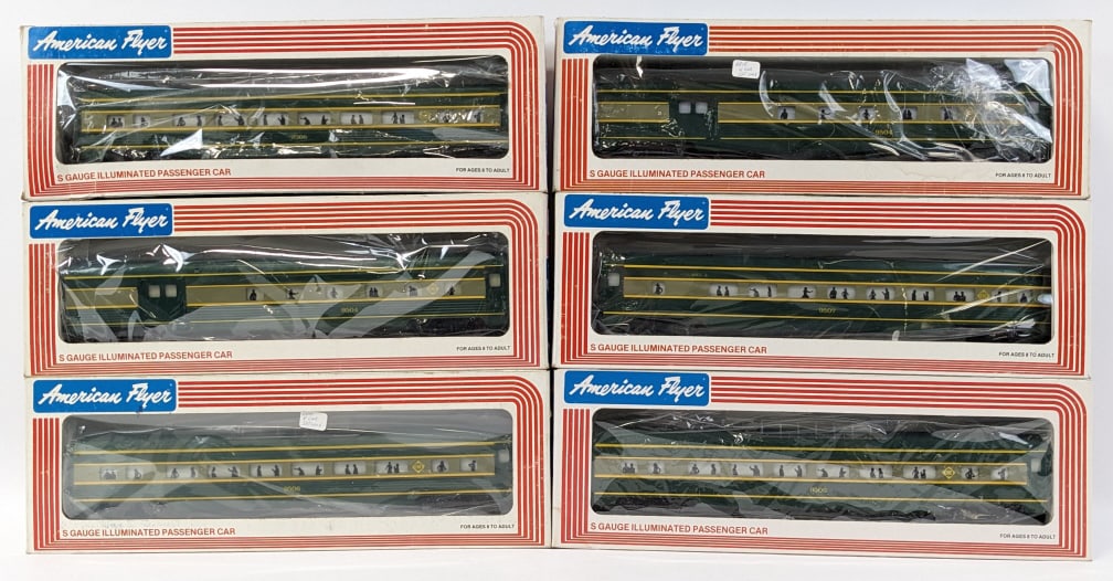 (6) American Flyer Erie Passenger Cars: (6) American Flyer S Gauge Erie passenger cars. Includes (2) Erie combo car #9504, (2) vista dome car #9506, pullman car #9505, and observation car #9607. Both come in the original boxes with some wea