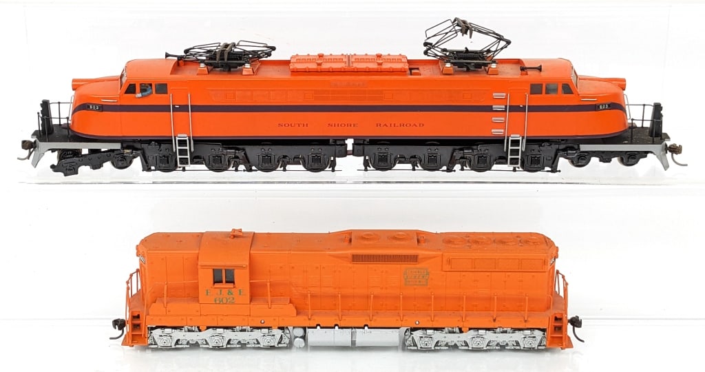 NWSL HO South Shore RR #803 & EJ&E #602 Locos: NWSL HO Scale South Shore Railroad #803 loco and HO E.J.&E. Chicago Outer Belt locomotive. Both have dust and wear from use / display.