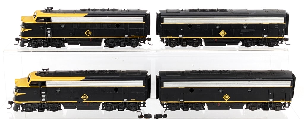 Broadway HO Scale Erie #711A / B / C / D: Broadway Limited Imports HO Scale Erie #711A / #711B / #711C / #711D powered and nonpowered units. The C, B, and D units have damaged couplers. Some have some paint loss, dust, and wear from use / dis