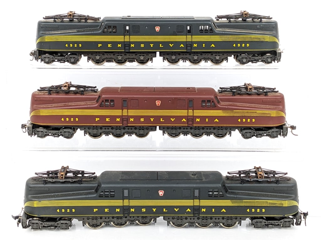 (3) Rivarossi HO Scale Pennsylvania #4929 GG1 Loco: AHM / Rivarossi HO Scale Pennsylvania #4929 GG-1 electric locomotives. The one is missing the front coupler. All have some wear from use / display.
