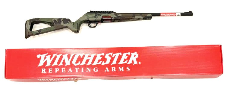 Winchester Wildcat .22 LR Camo Rifle NIB: Winchester Wildcat .22 LR Camo Rifle NIB. The Winchester Wildcat is in new condition and in the original Winchester box. Barrel measures 18 inches in length. The semi-auto Rifle comes in a camo patter