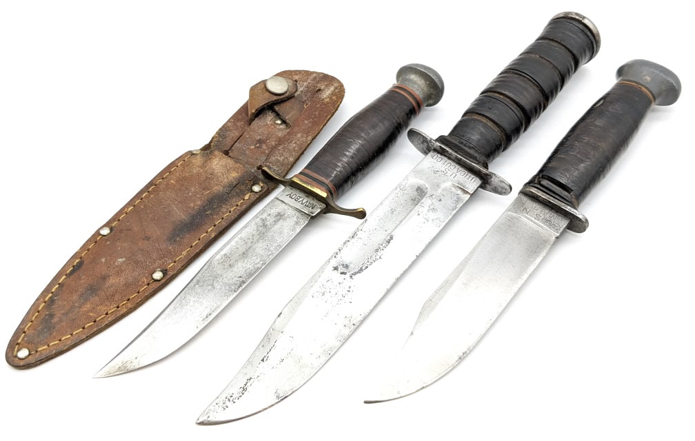 US Utica Cut Co, PAL, and Navy Boy Fighting Knives: US Utica Cut Co, PAL, and Navy Boy Fighting Knives. Knives have various wear on the blades and handles from use and age. Largest blade length of 7in and overall length of 12in.