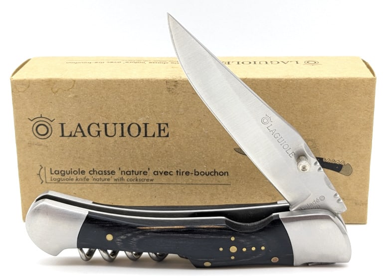 NIB Laguiole DUB212 Corkscrew Folding Knife: NIB Laguiole DUB212 Corkscrew Folding Knife. Features file work along the spine and leaf spring, bee shaped lock, and black stamina wood handle scales. Overall measures 5in when closed.