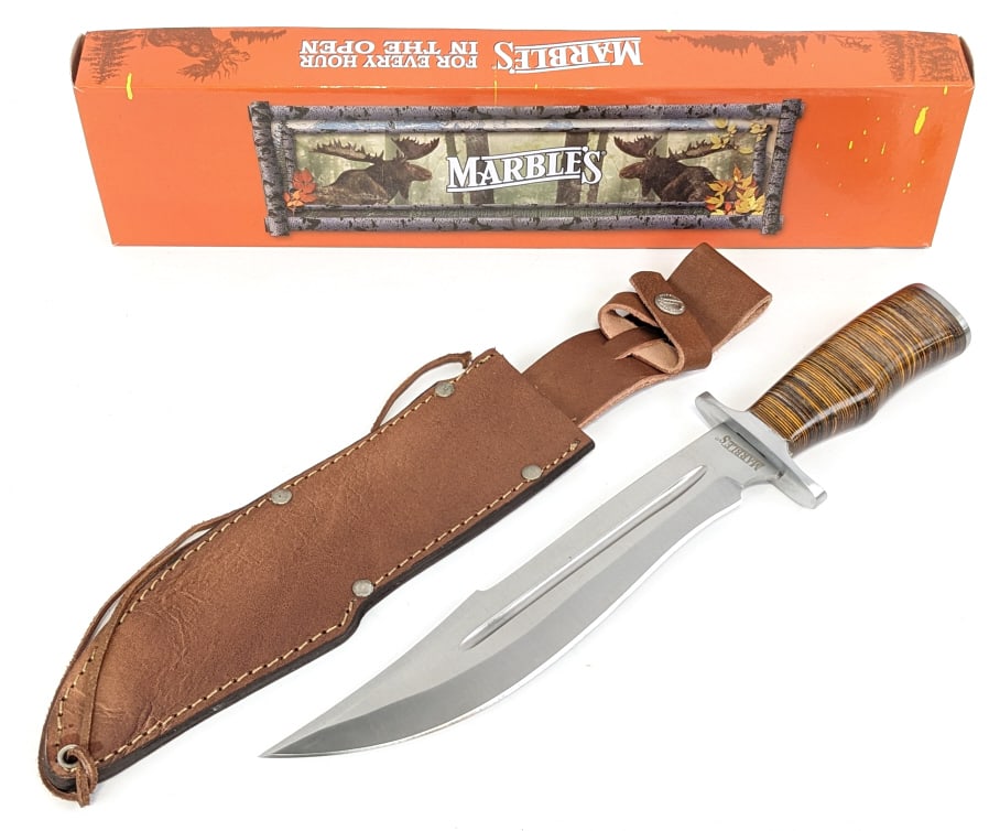 NIB Marbles Stacked Leather 10in Bowie Knife: NIB Marbles Stacked Leather 10in Bowie Knife MR621 w/ Sheath. Blade length of 10in and overall length of 15in.