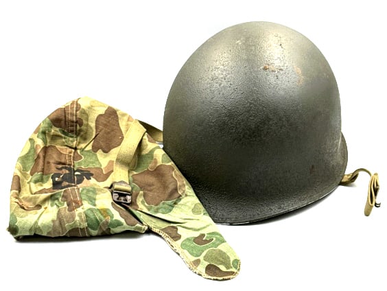 WW II US M1 Helmet with Liner: WW II US M1 Helmet with Liner . The US Military Helmet is in very nice used condition. Liner is in very nice used condition. Camo cover does obtain some staining and one small tear. Leather front stra
