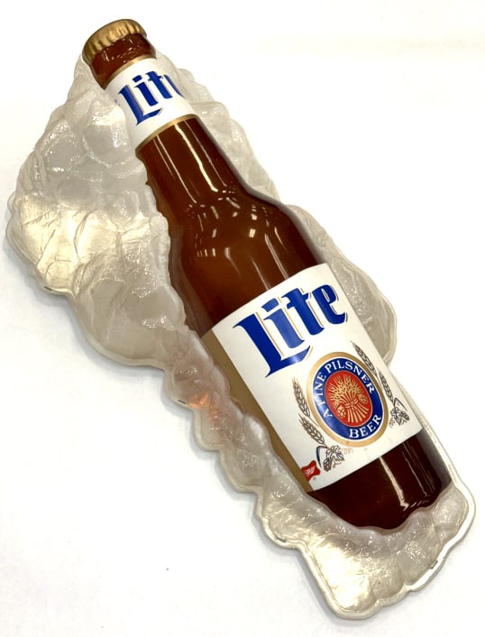 1993 Miller Lite Beer Bottle On Ice Advertisement: 1993 Miller Lite Beer Bottle On Ice Advertisement Sign. This Is A Great 3D Advertisement Piece That Can Be Displayed Mounted On A Wall Or Laying On A Flat Surface. It Is In Very Good Condition without