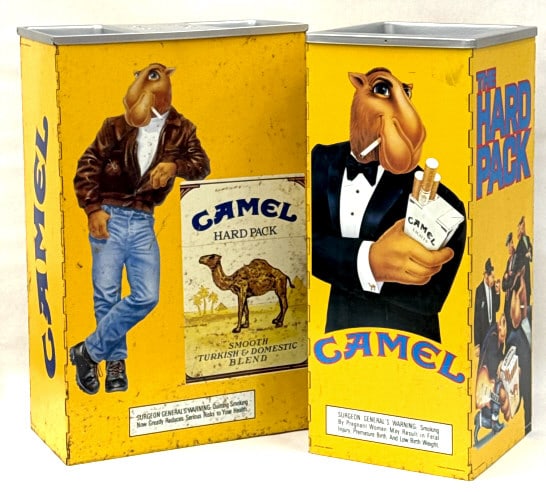 (2) 1991 Joe Camel Free-Standing Folding Ashtrays: (2) 1991 Joe Camel Free-Standing Folding Ashtrays. These Tin Ashtrays Are Designed To Fold For Storage and Moving. One Ashtray Has A Double Receptacle Top And The Other Features "The Hard Pack" Band.