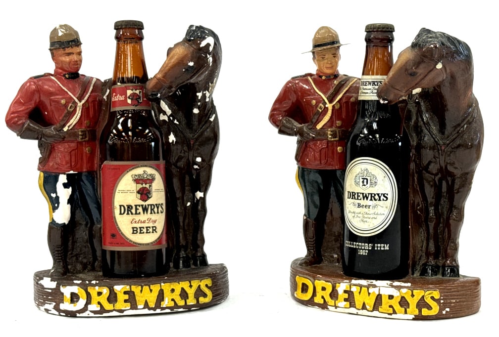 Pair of 1950's Drewrys Beer Figurine Bar Displays: Pair of 1950's Drewrys Beer Chalkware Figurine Bar Advertisement Displays with bottles. Both have some chipping and wear due to display and age (pictured). Mfg by Plasto Co. One including sealed 1967