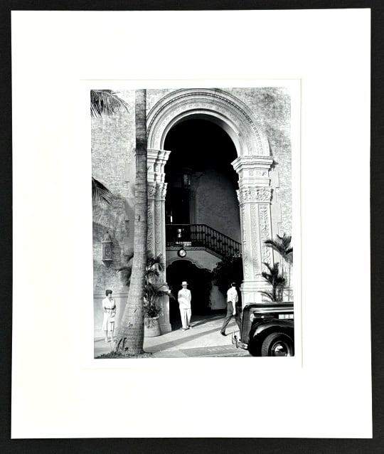 Marion Post Wolcott "Miami Beach Hotel" Photograph: Photograph by photographer Marion Post Wolcott. The photograph is titled "Entrance Miami Beach Hotel" and is in exceptional condition. Photograph and border measure 9-3/4" across x 12-3/4" tall.