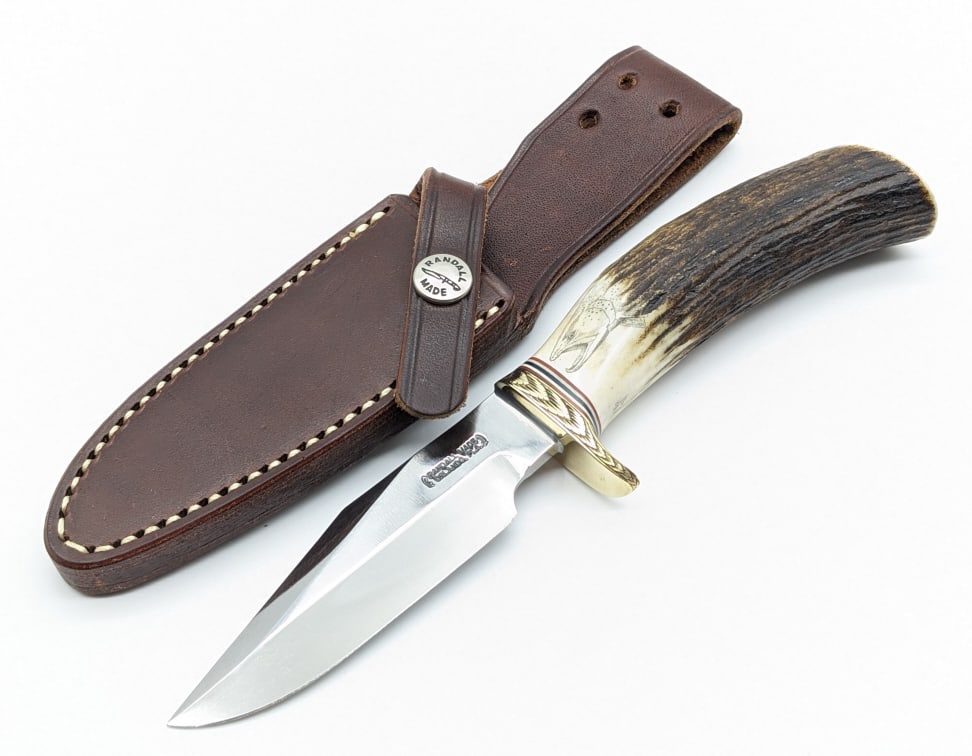 Randall Mod 8 Scrimshaw Stag Engraved Trout & Bird: Randall Mod 8 Scrimshaw Stag Engraved Guard Trout & Bird w/ Sheath. Knife features a gorgeous engraved brass single down turned guard, and a stag handle with a trout and a duck scrimshawed one on each